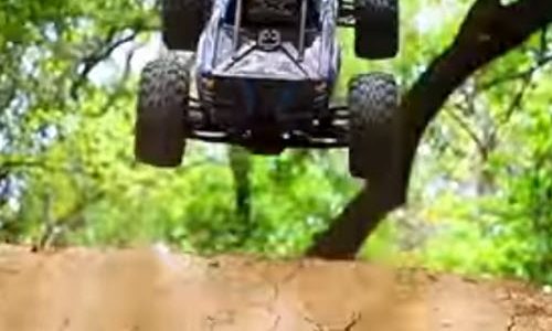 Traxxas X-Maxx Versus BMX Dirt-Jump Trail [VIDEO]