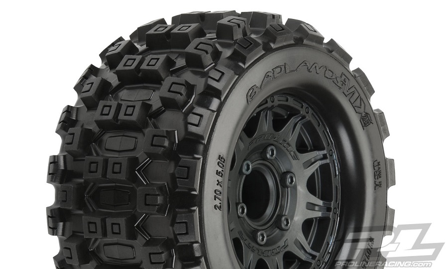 Pro-Line Badlands MX28 2.8" All Terrain Tires Mounted On Raid Black Removable Hex Wheels